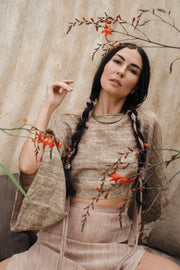 Model wearing Padma raw silk Bali boho shirt in natural cream